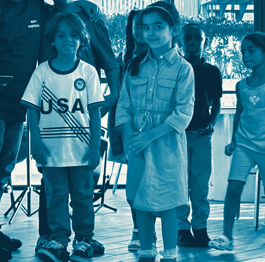 Kids from the church standing together and smiling