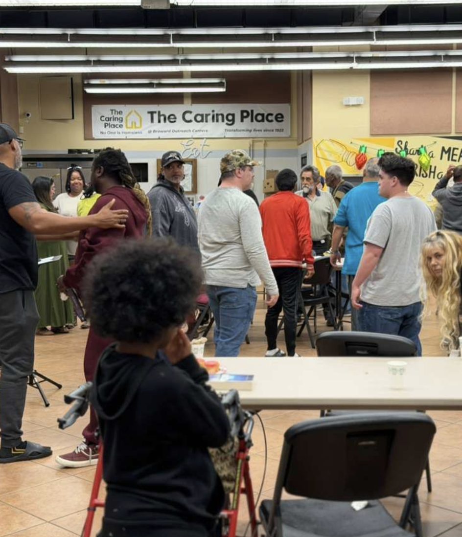 Neighbors gathered at The Caring Place for Jesus + Recovery