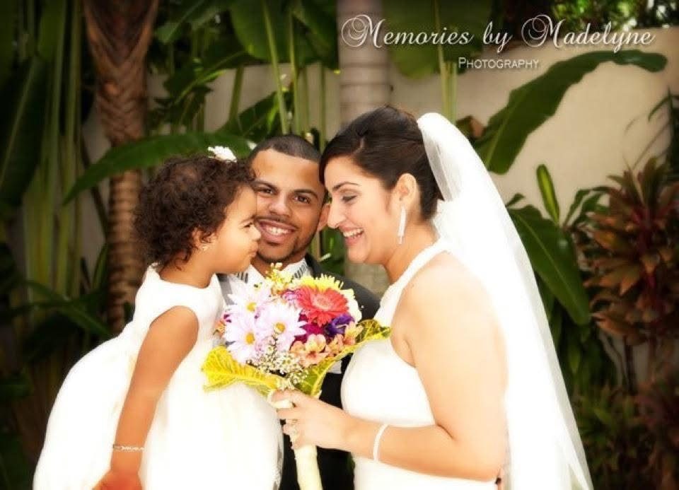 David and Ruth on their wedding day with their daughter