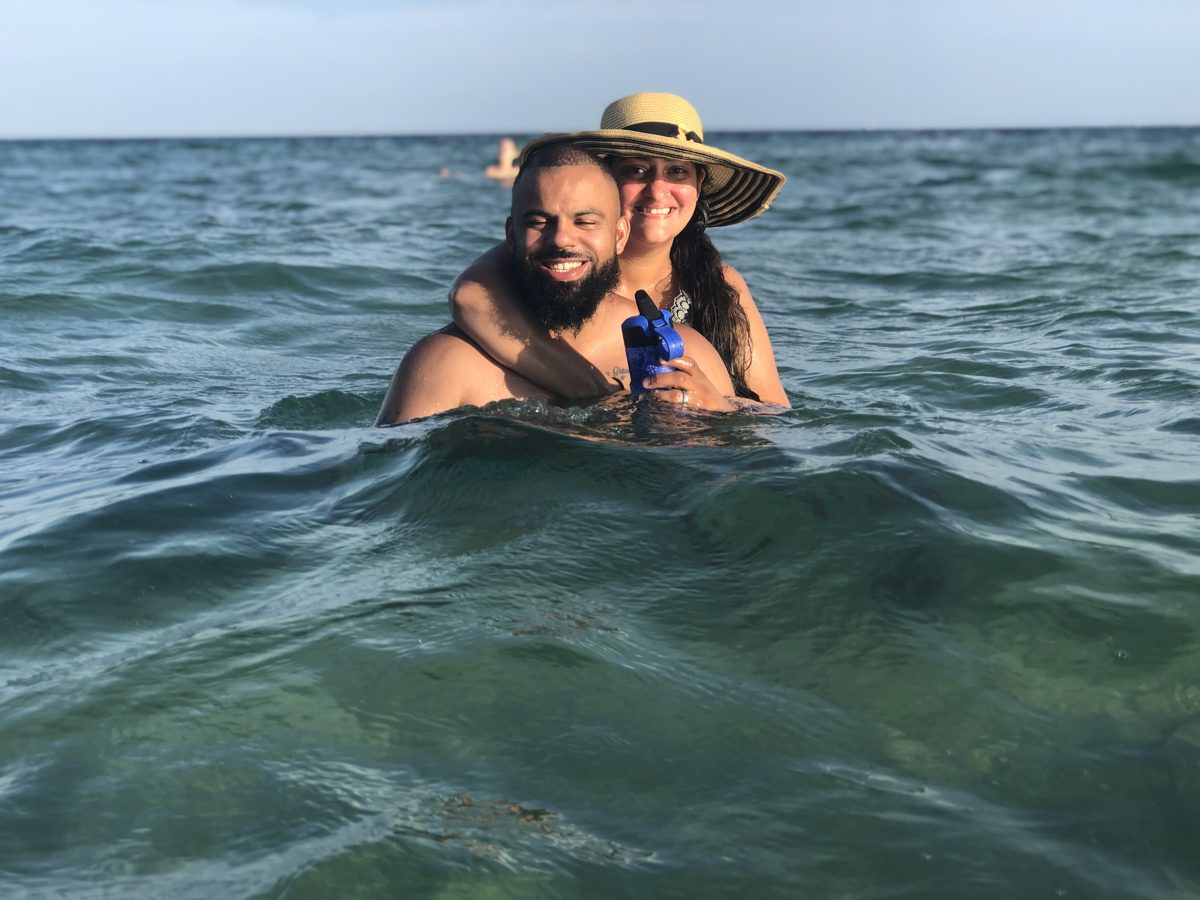 David and Ruth laughing together in the ocean